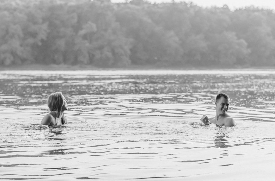 couples photo session in water black and white