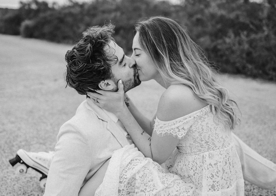 wedding couple kissing black and white intimate