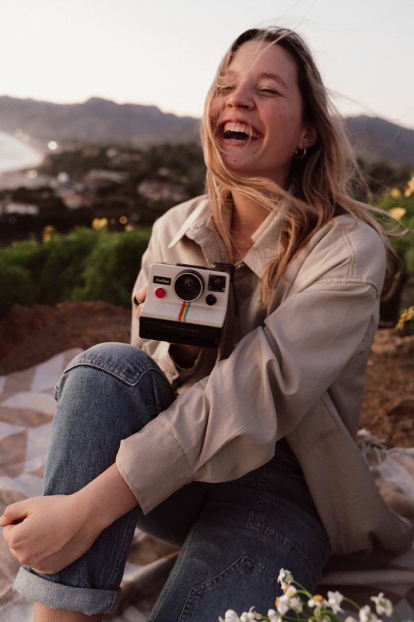 polaroid camera girl smiling