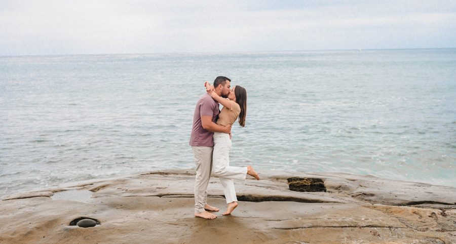 windansea beach couple kissing