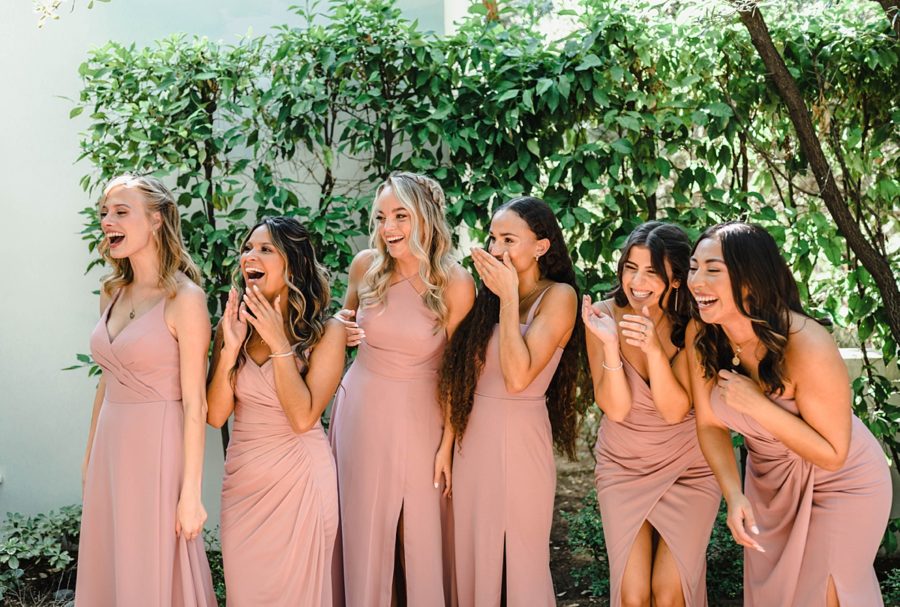 bridal party smiling first look