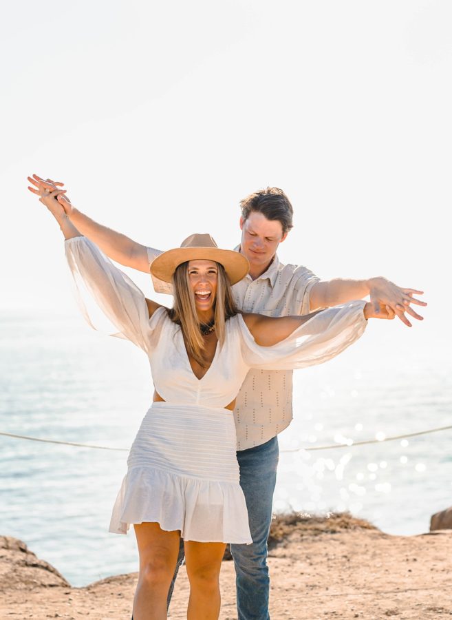 crystal cove state park engagement couple holding hands