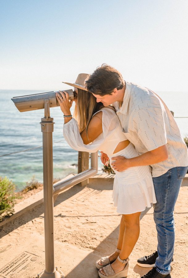 couple hugging crystal cove water background