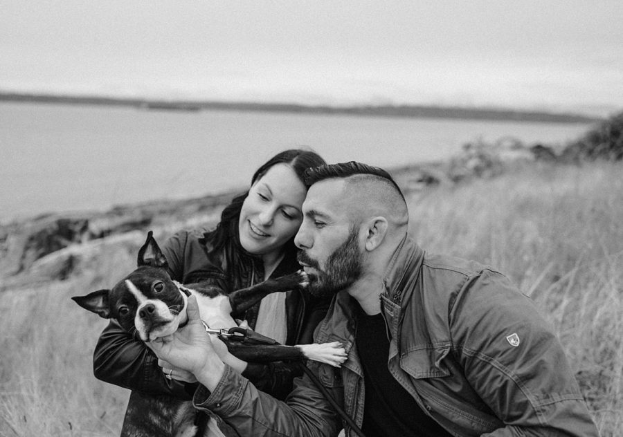 black and white fall engagement discovery park couple hugging dog