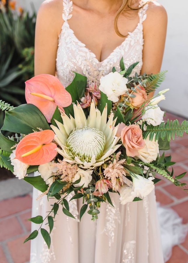 bride bouquet wedding dress king protea florals