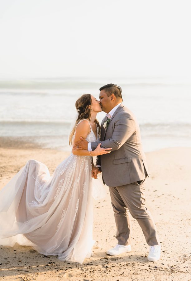 ole hanson beach club wedding bride and groom kissing