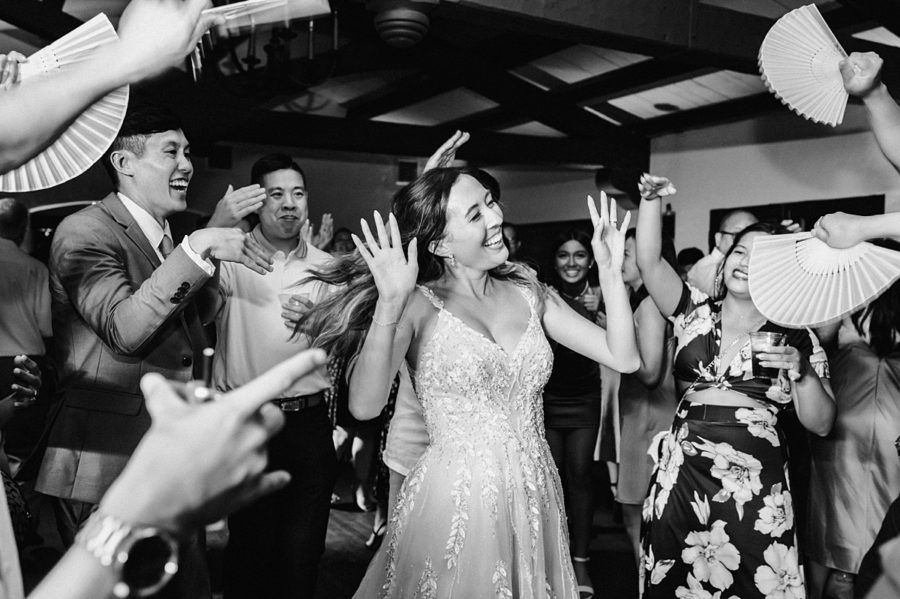 black and white reception bride dancing 