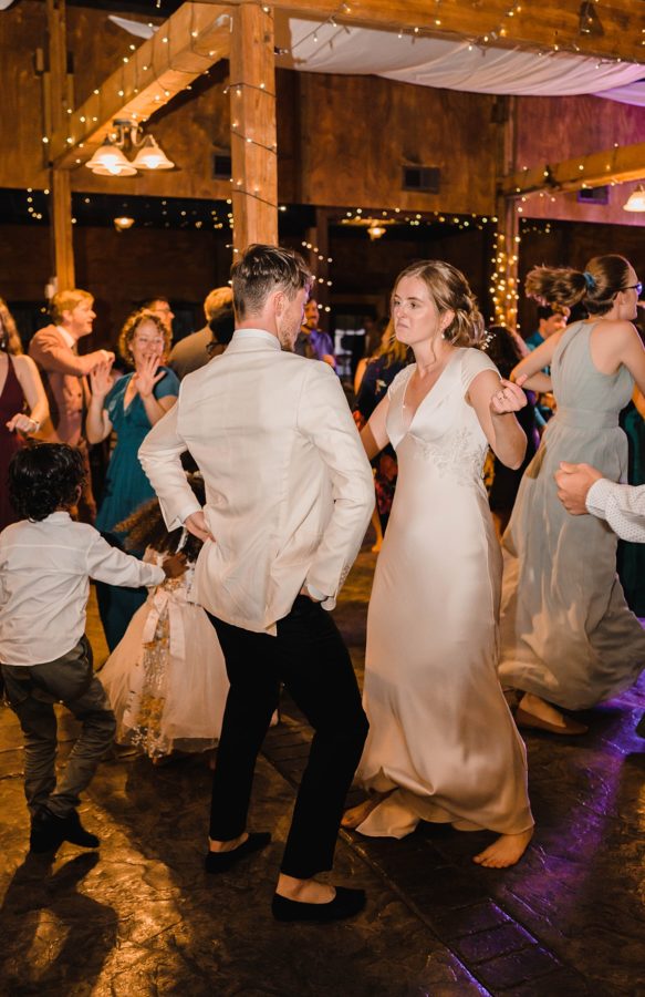bride and groom dancing reception