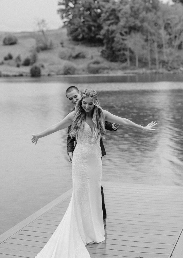 bride and groom first look on dock bride twirling big spring farm