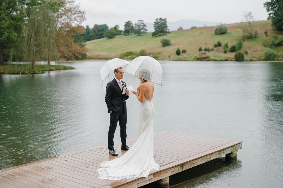 bride and groom private vow reading on dock big spring farm