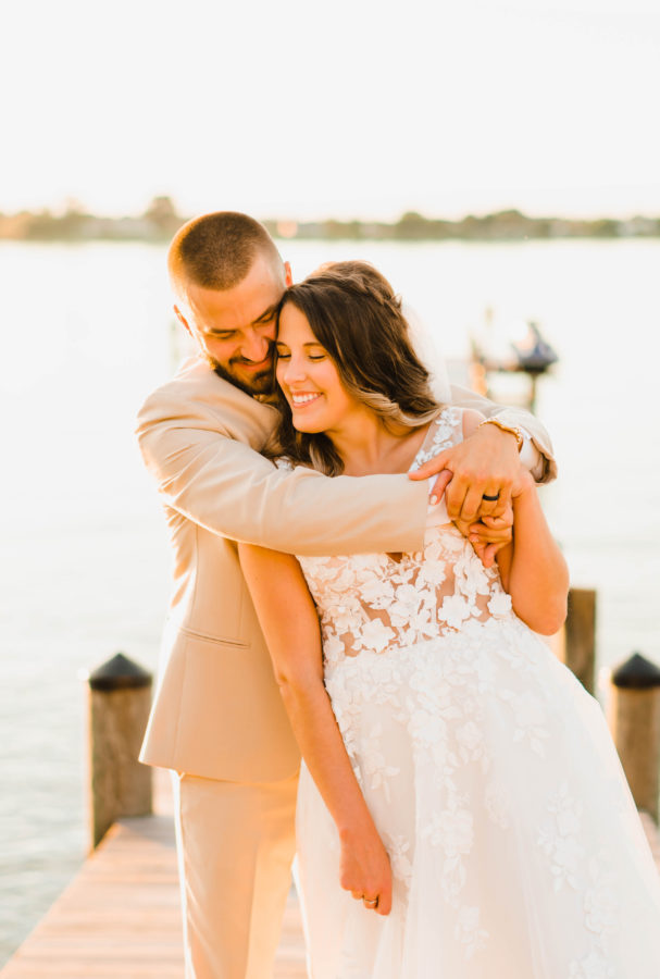 your unique wedding bride and groom hugging