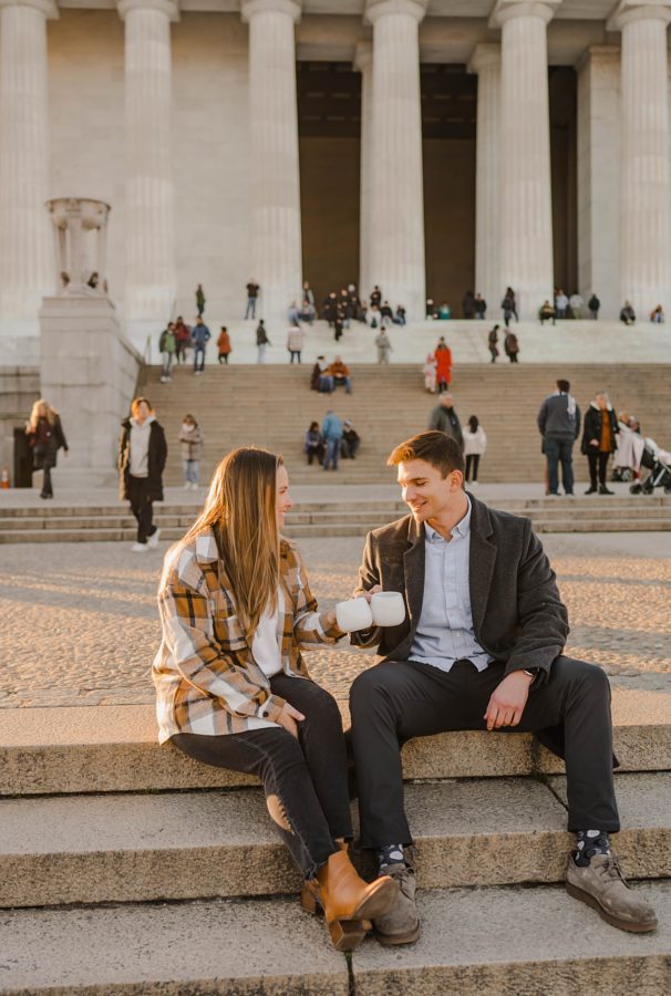 lincoln memorial steps couple holding warm mugs