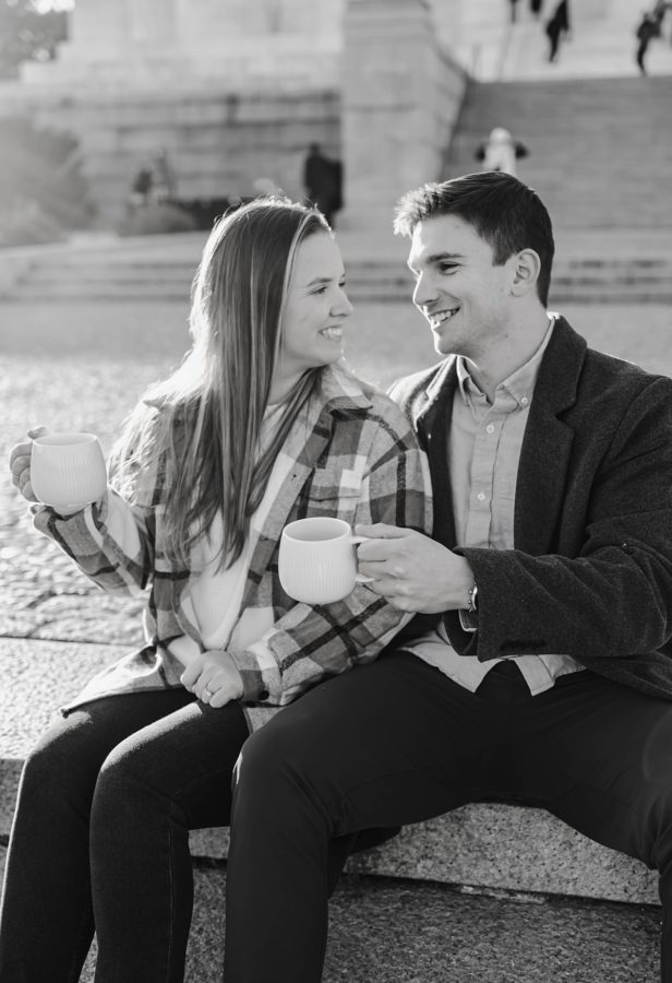 black and white lincoln memorial winter engagement couple smiling
