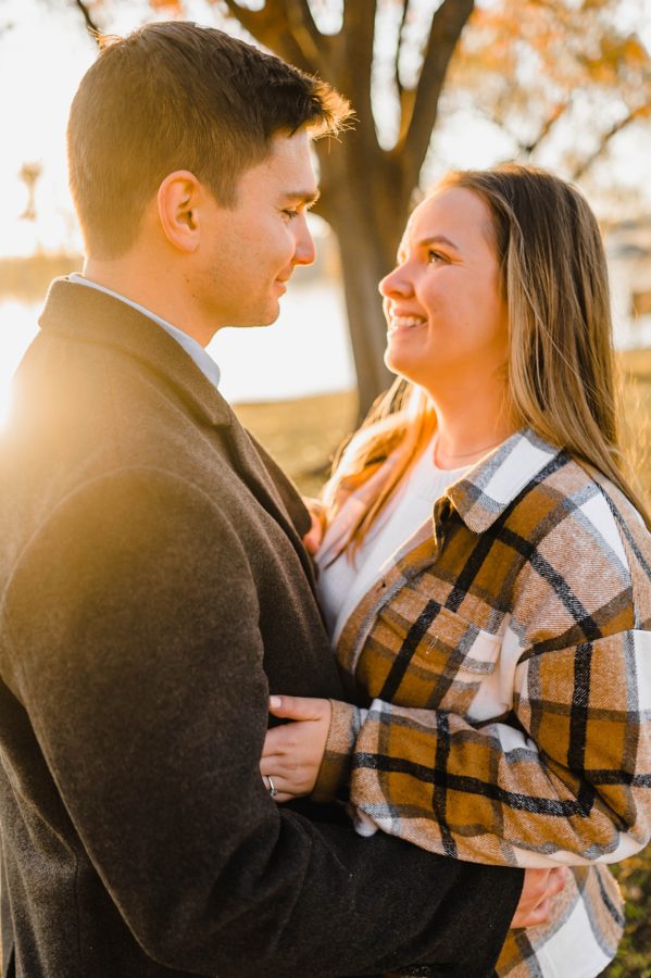 lincoln memorial winter engagement couple hugging smiling