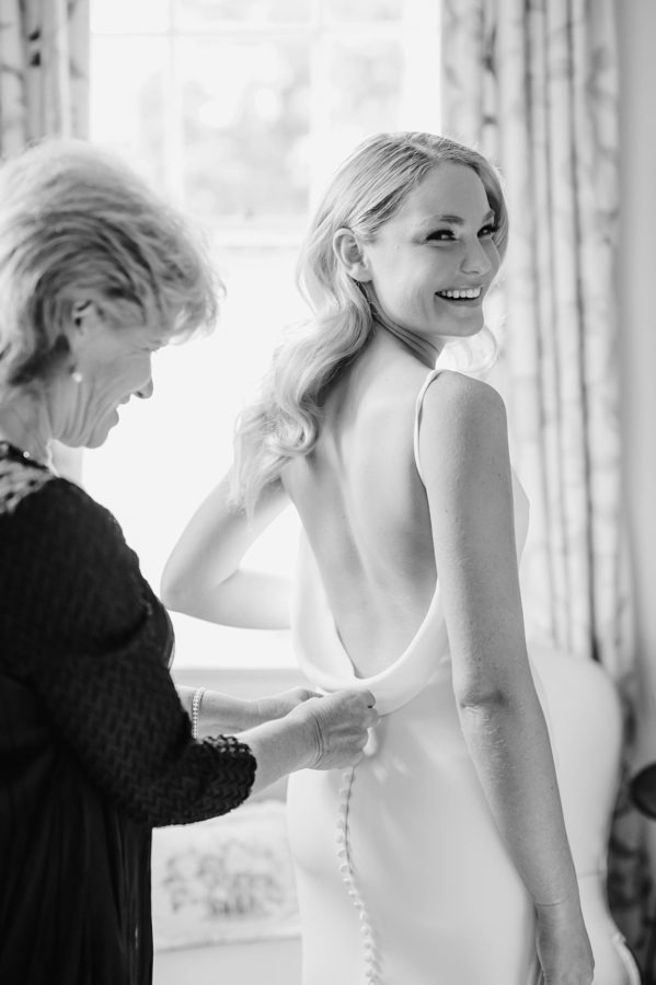 black and white bride getting ready mother of the bride wedding dress