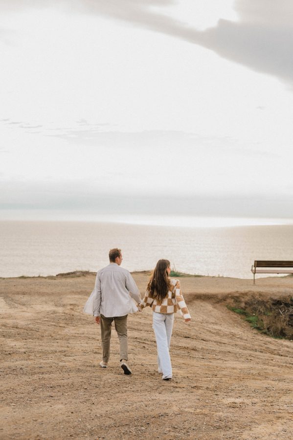 san clemente couples shoot walking holding hands