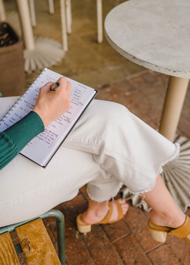 california photographer brand shoot woman writing in notebook