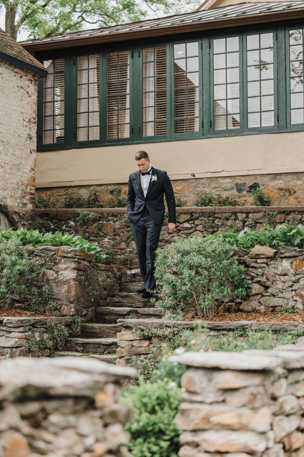 middleburg garden wedding groom portrait walking down steps